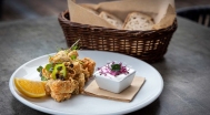 Crispy catfish bites with garlic sour cream and sourdough bread