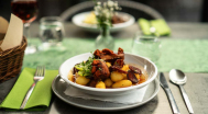 Potato paprikash with new potatoes, smoked sausage, crispy 