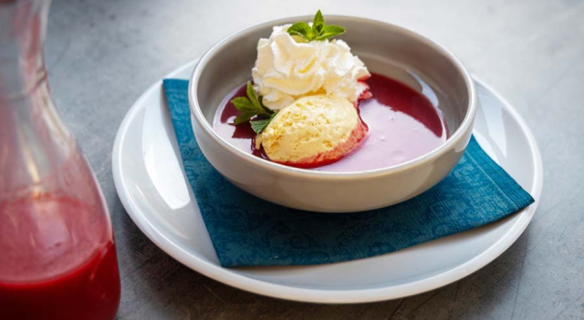 Raspberry cream soup, served with vanilla ice cream